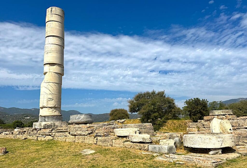 Ancient Temple of Hera ruins with solitary column against blue sky