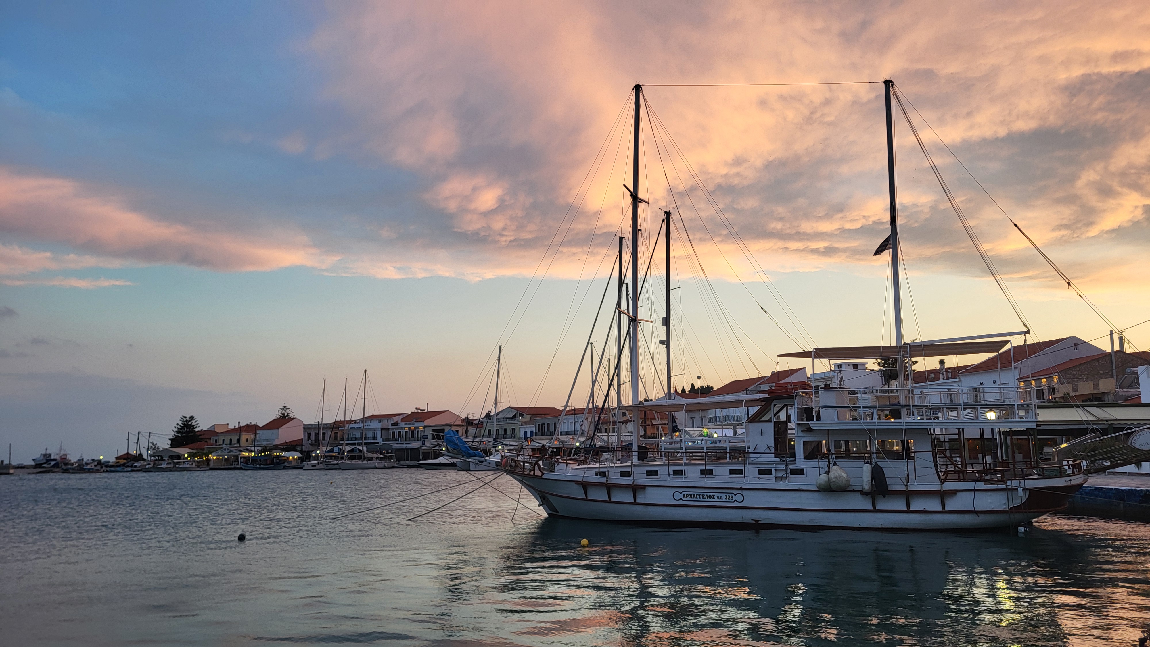 Pithagorio harbor with traditional Greek architecture and ancient fortifications